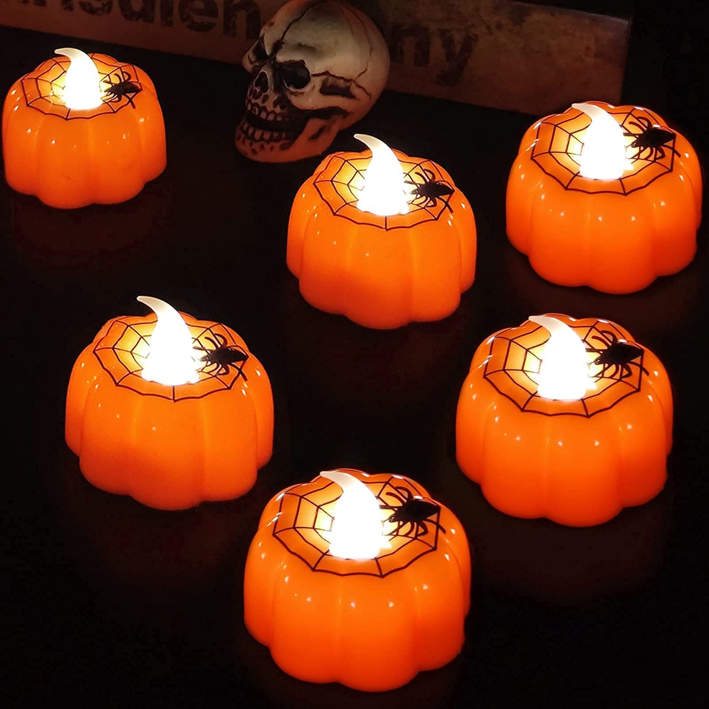 TURNMEON 12 Pack Halloween Pumpkin Tealights Candles with Spider Web Decor, LED Pumpkin Lights, Flame Less Candle Battery Operated Halloween Table Decorations Home Fireplace Party Thanksgiving Fall