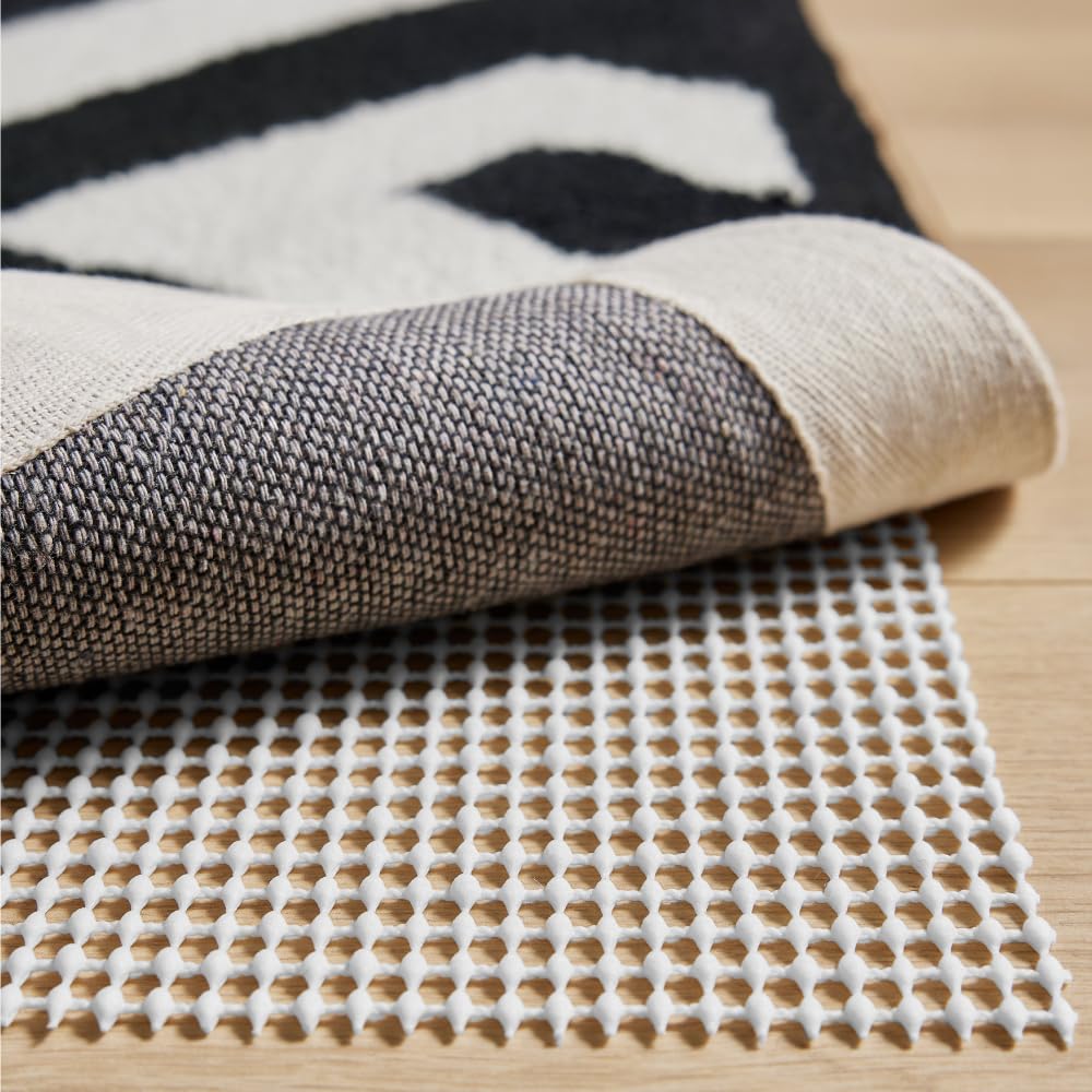 Strong Rug Pad Gripper, 2x4 FT, US Designed, Grips Help Keep Area Rugs Safe and in Place, Slip and Skid Resistant Pads for Hard Floors, Under Carpet Mat Cushion and Hardwood Protection