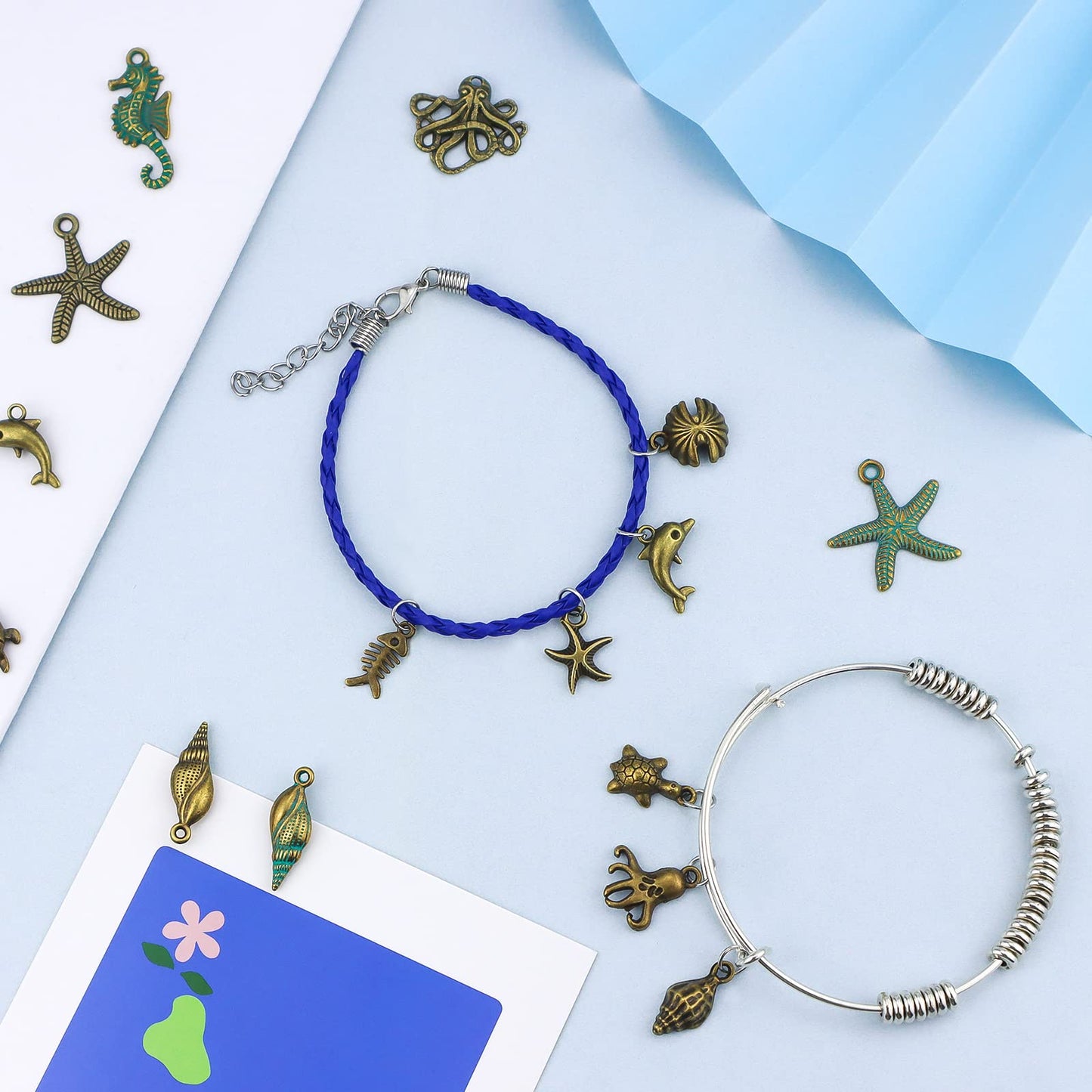 JIALEEY 100 Gram Assorted Antique Ocean Themed Charms Bronze Ocean Fish Sea Creatures Beads Pendants for Jewelry Making and Craft Making