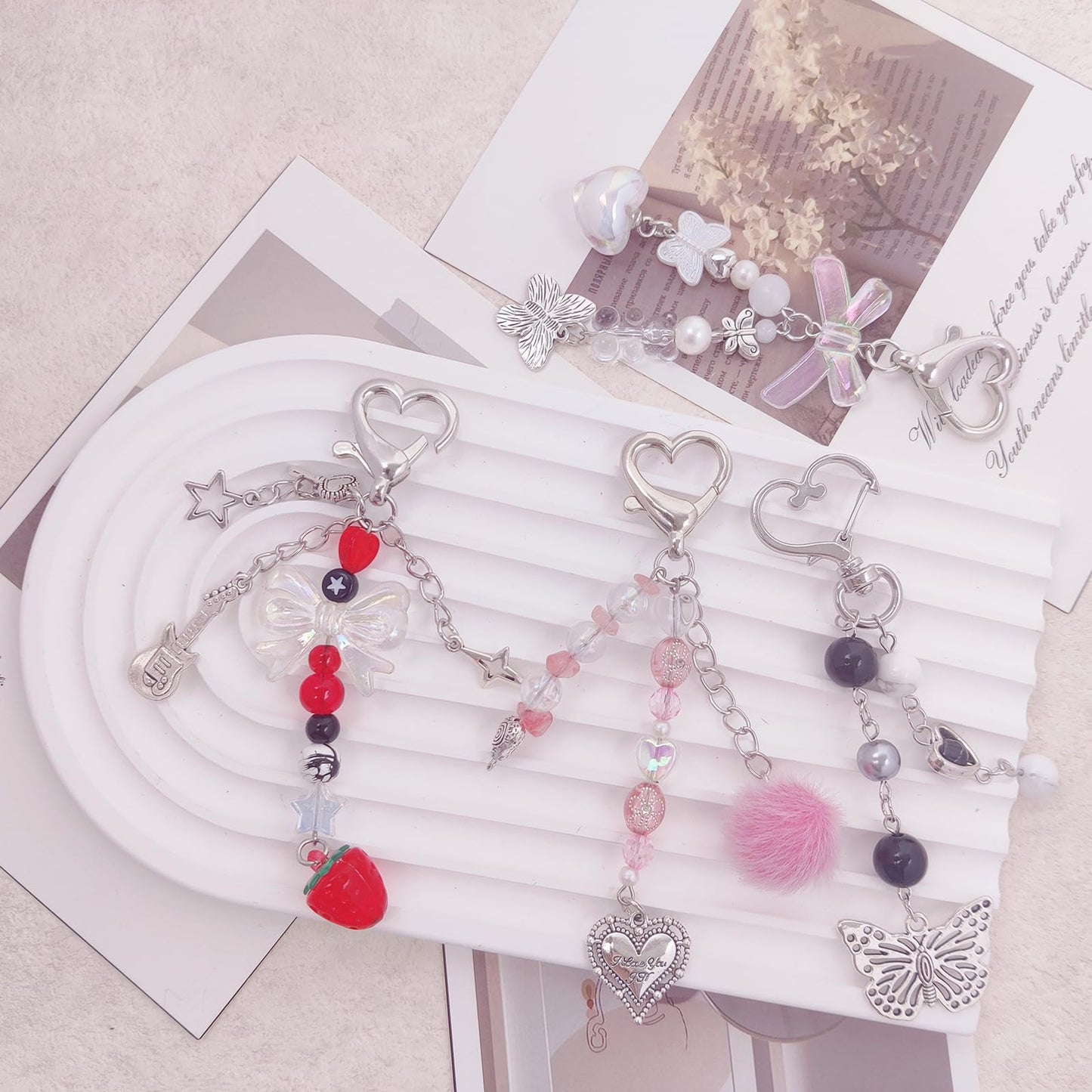 AGEN KGEN Aesthetic Y2K keychains Cute Butterfly Star Strawberry Bear Guitar Keychains for Women Keychain Charms Bag Purse Phone Charms Pendant Gifts (4x Exquisite Sets)