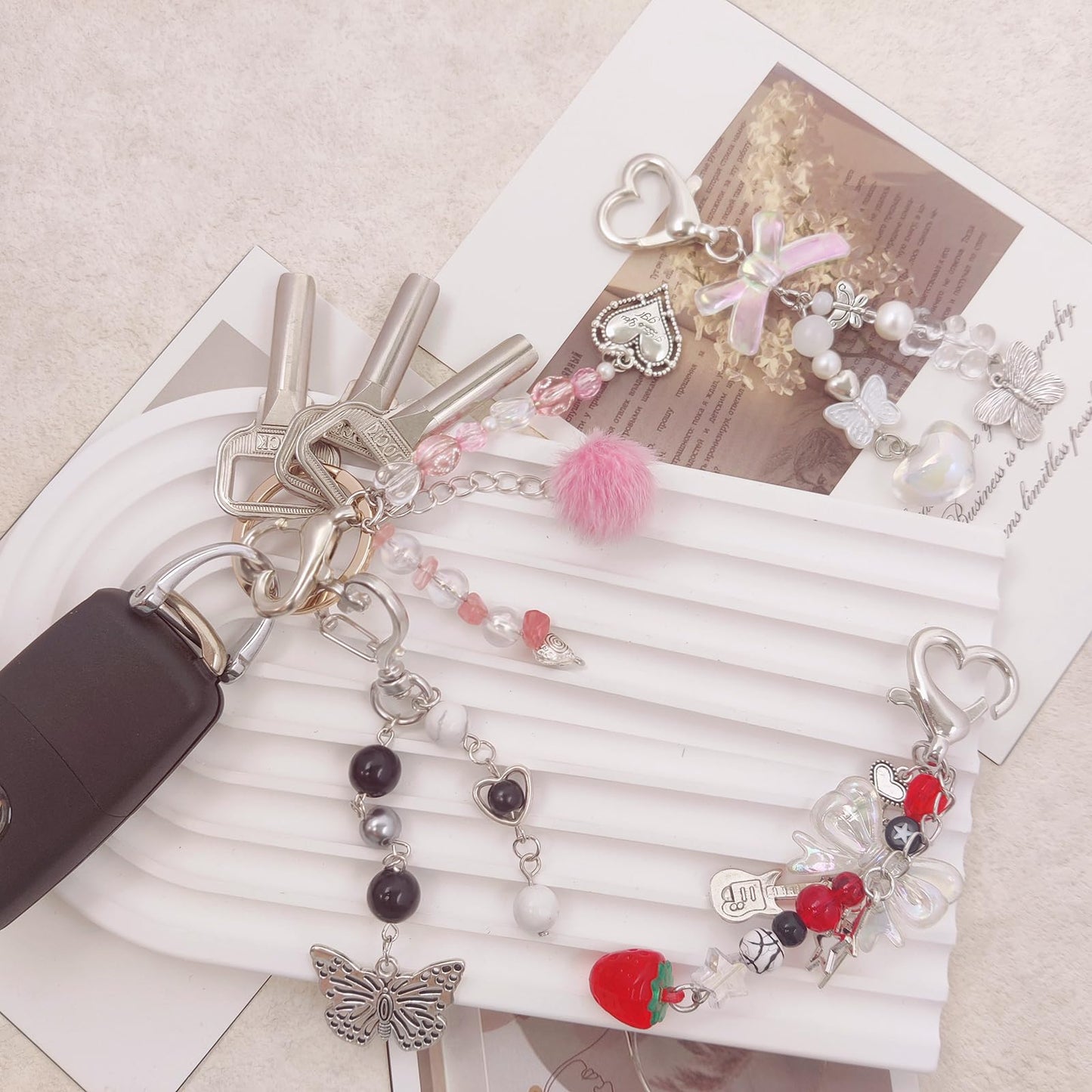 AGEN KGEN Aesthetic Y2K keychains Cute Butterfly Star Strawberry Bear Guitar Keychains for Women Keychain Charms Bag Purse Phone Charms Pendant Gifts (4x Exquisite Sets)
