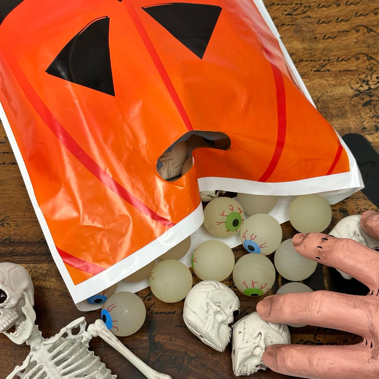 GiftExpress 50‑Pack 11″ × 17″ Jack O  Lantern Trick or Treat Goody Bags – Durable Plastic Halloween Party Favor Bags