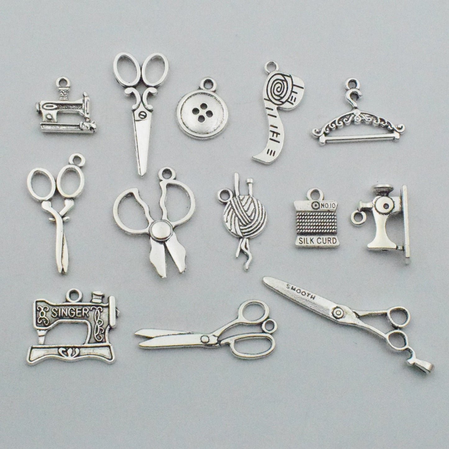 Sewing Charms Collection-100g About (60-65pcs) Antique Silver Craft Supplies Sewing Charms Pendants for Crafting, Jewelry Findings Making Accessory for DIY Necklace Bracelet (M003)