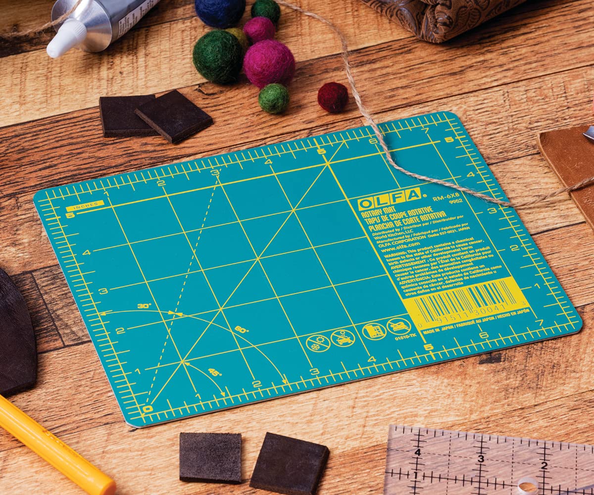 OLFA 6" x 8" Self Healing Rotary Cutting Mat (RM-6x8) - Double Sided 6x8 Inch Cutting Mat with Grid for Quilting, Sewing, Fabric, & Crafts, Designed for Use with Rotary Cutters (Green)
