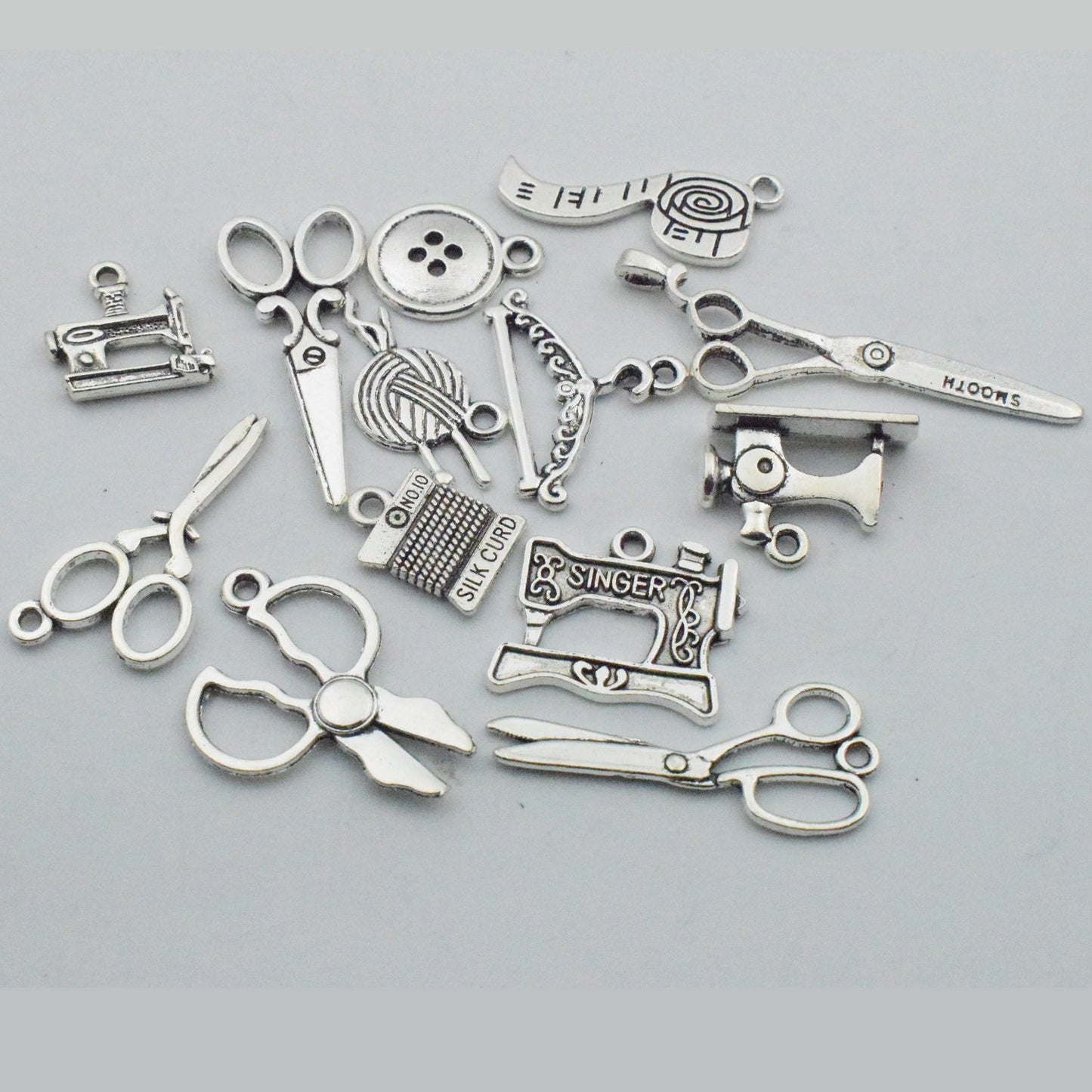Sewing Charms Collection-100g About (60-65pcs) Antique Silver Craft Supplies Sewing Charms Pendants for Crafting, Jewelry Findings Making Accessory for DIY Necklace Bracelet (M003)