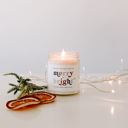 Sweet Water Decor Merry and Bright Soy Candle | Bayberry, Clove, Nutmeg, Ginger, Cypress, Cedar, Balsam Fir and Musk Scented Candles for Home | 9oz Clear Jar, 40+ Hour Burn Time, Made in The USA