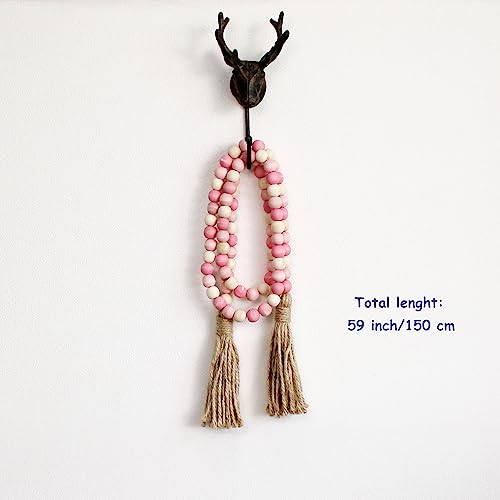 CVHOMEDECO. Wood Beads Garland with Tassels Farmhouse Rustic Wooden Prayer Bead String Wall Hanging Accent for Home Festival Decor. Pink Mix Distressed